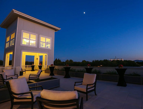Patio seating area at night.