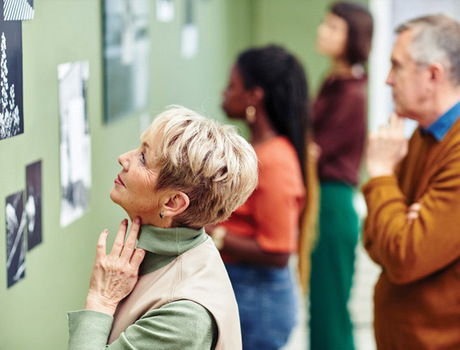 Residents enjoying art at a museum.