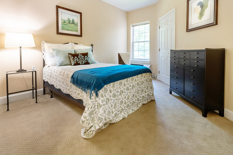 A fully furnished bedroom.