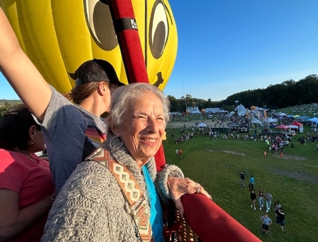 3 people in hot air balloon