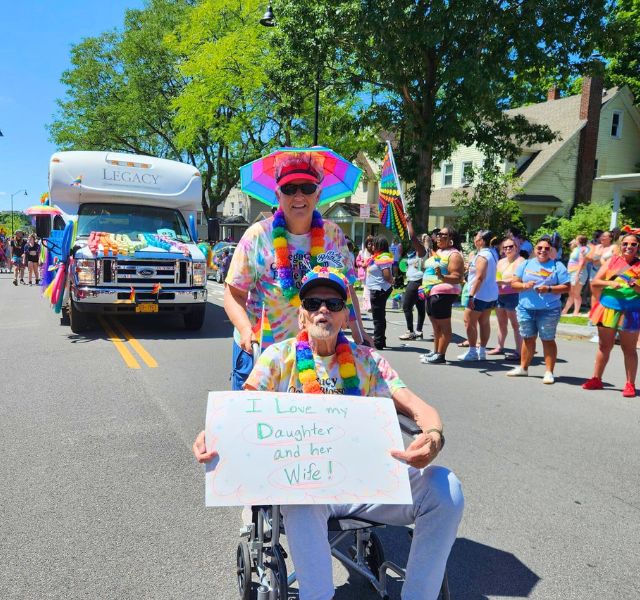 A resident in a Pride parade. 
