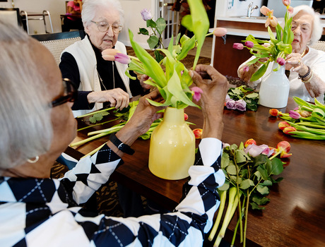 People arranging flowers.