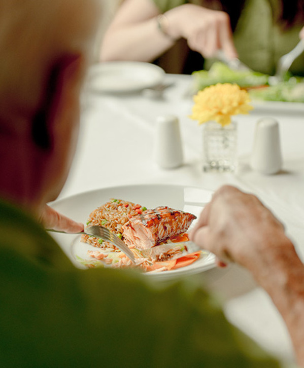 A person eating dinner.