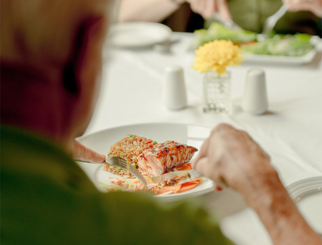 A person eating dinner.