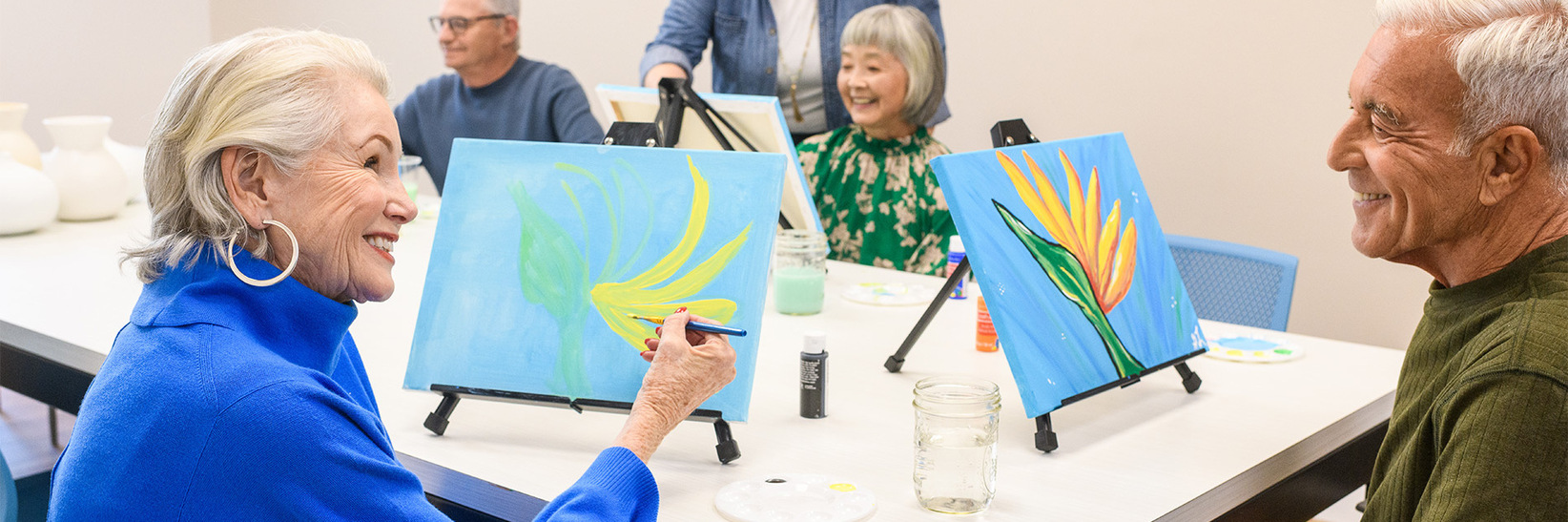 Assisted living residents painting in a class at The Watermark at San Jose senior living community. Assisted living residents painting in a class at The Watermark at San Jose senior living community.