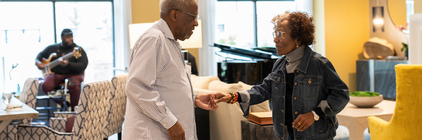 Residents dancing to live music. Residents dancing to live music.