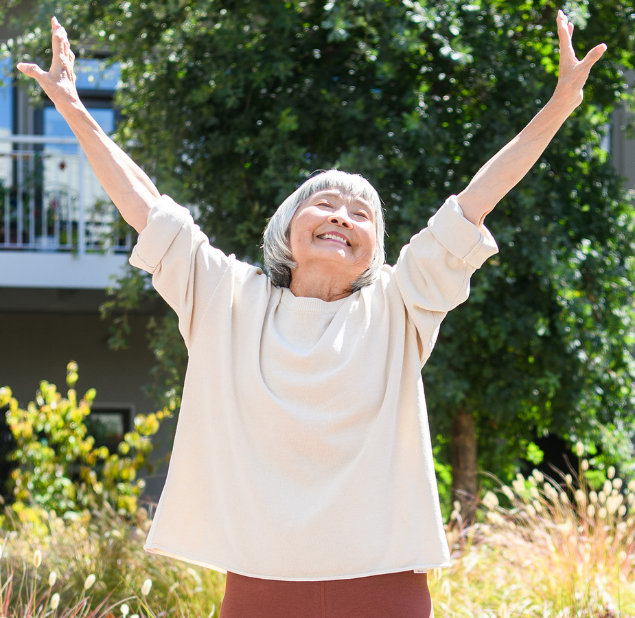 A resident is stretching outside.