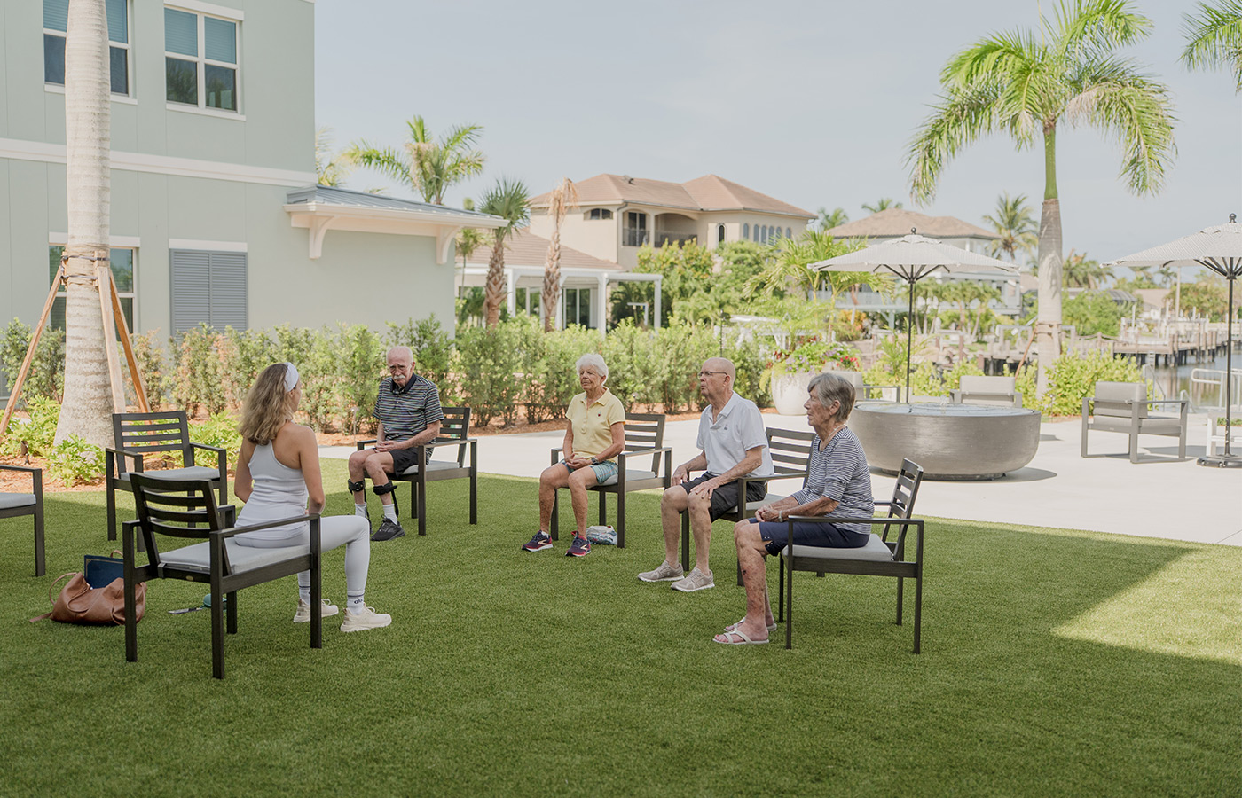 People working out on the lawn.