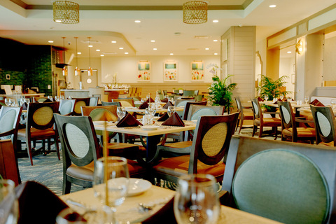 A dining room with tables.