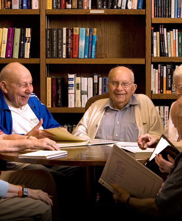A group of residents gathered in the library.