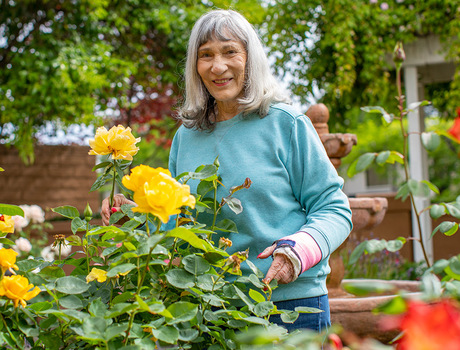 A resident tending to some plants.