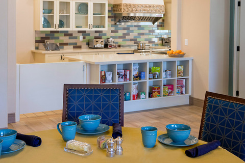 Dining room with seating area.