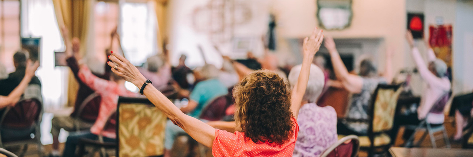 Residents are participating in a fitness class. Residents are participating in a fitness class.