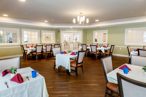 A dining room set for dinner.