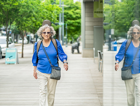 A person walking on the sidewalk.
