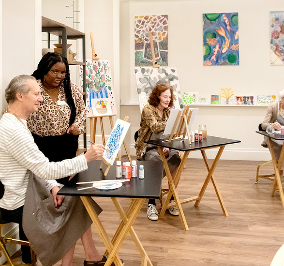 Residents are participating in an art class.