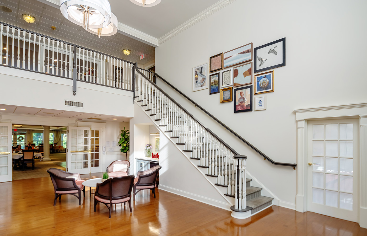 A bright lobby area with a staircase.