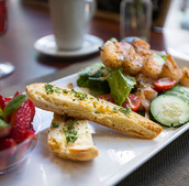 Shrimp salad and bread with fruit.
