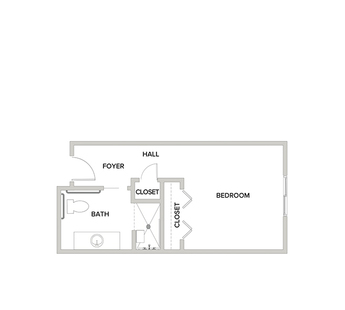 A memory care studio suite floor plan with an open living/bedroom space.