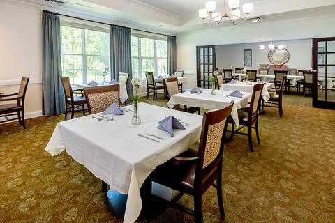 A dining room set for service.