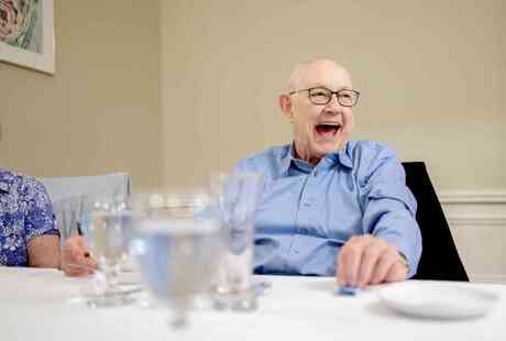 A resident of the Fountains at Greenbriar celebrating.