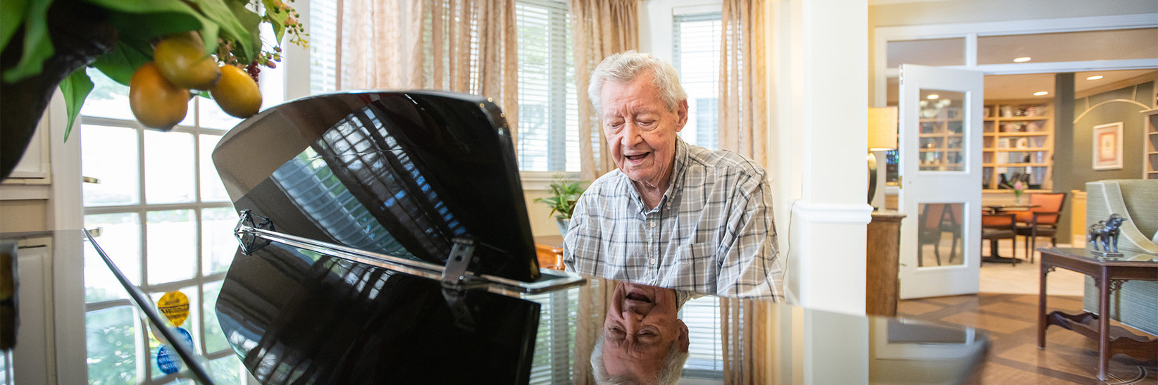 A person playing piano. A person playing piano.