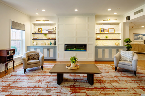 A community living room with a fireplace.