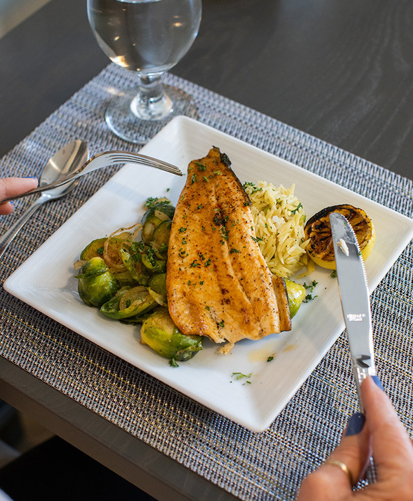 Grilled fish on a plate.
