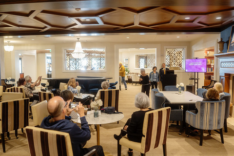 A bunch of people in a lounge.