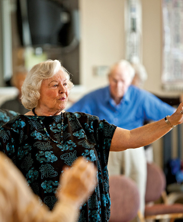 Accordion image Residents are in a tai chi class.
