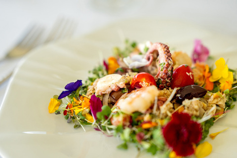 A seafood salad on a plate.