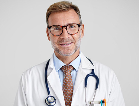 A doctor smiling.
