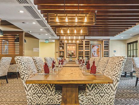 Dining room with seating area.