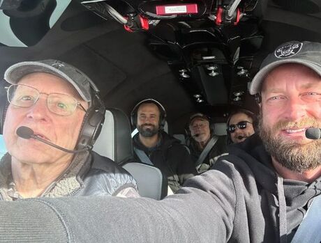 People in cockpit of plane