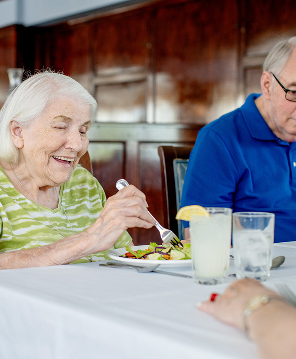 Two residents are having a meal together. Two residents are having a meal together.