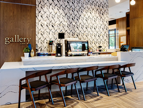 A cafe counter with seating.