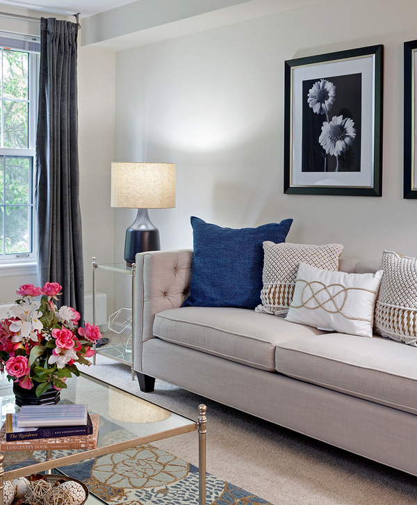 Accordion image A fully furnished living room.