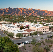 The Hacienda at the River exterior building and courtyard. 