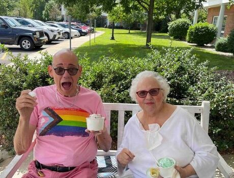 Two residents enjoying ice cream.