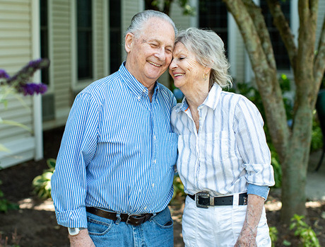 A couple together in the garden.