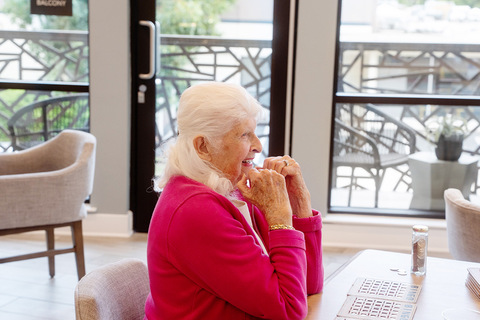 A person sitting smiling.