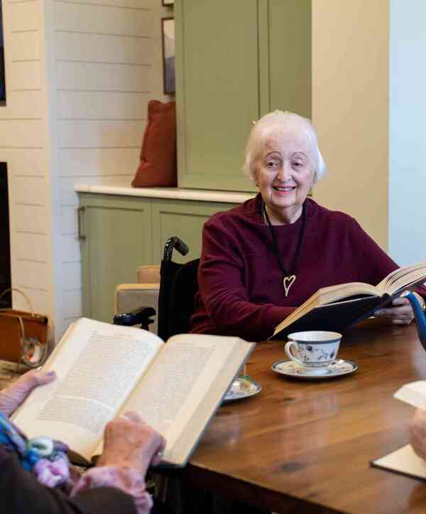 Residents having book club Residents having book club