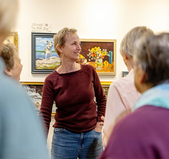 A person talking with others.