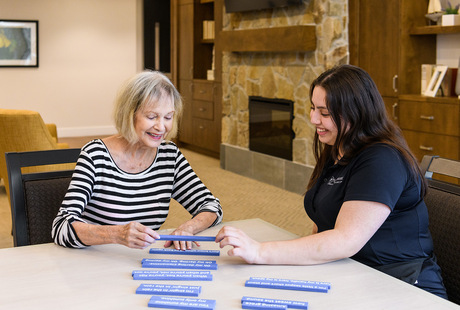 A caregiver working with a resident.