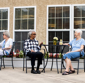 People having drinks on the patio.