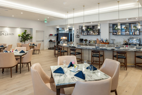 A dining room with seating.