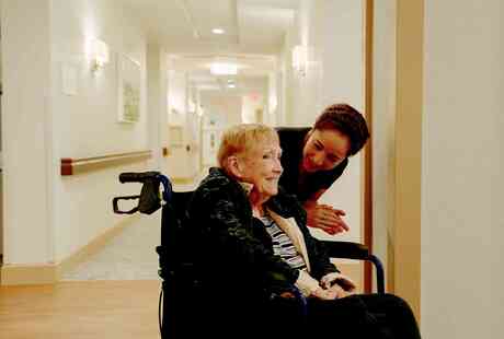 Memory care resident and caregiver. 