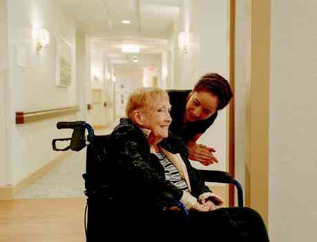 Memory care resident and caregiver. 