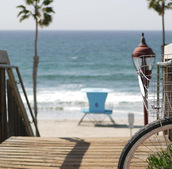 Bike parked by beach.