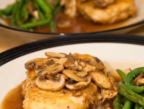 A chicken masala dish with green beans.